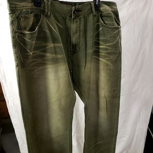 green Akoo brand jeans